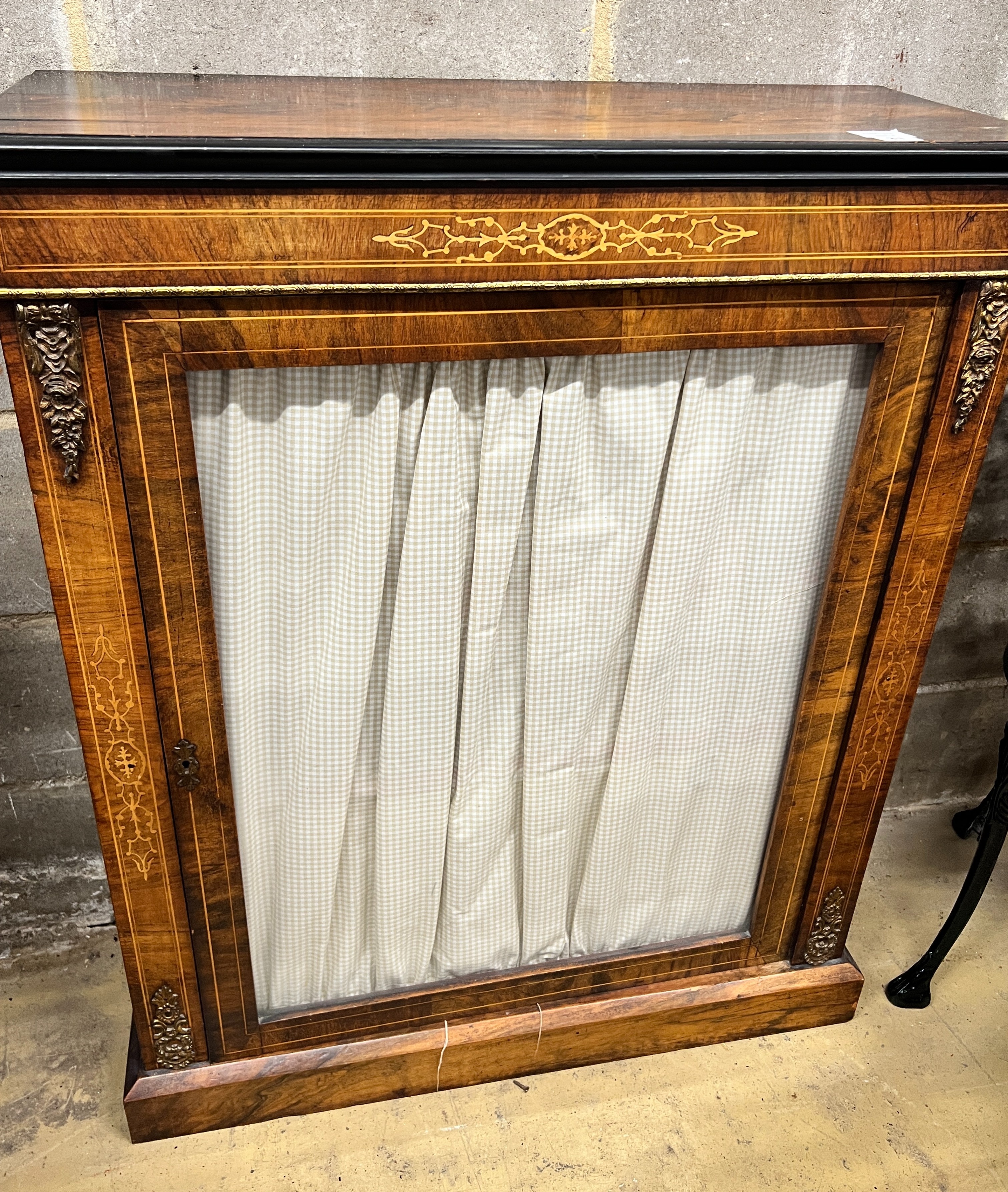 A Victorian gilt metal mounted inlaid walnut pier cabinet, with a single glazed door, width 80cm, depth 32cm, height 99cm